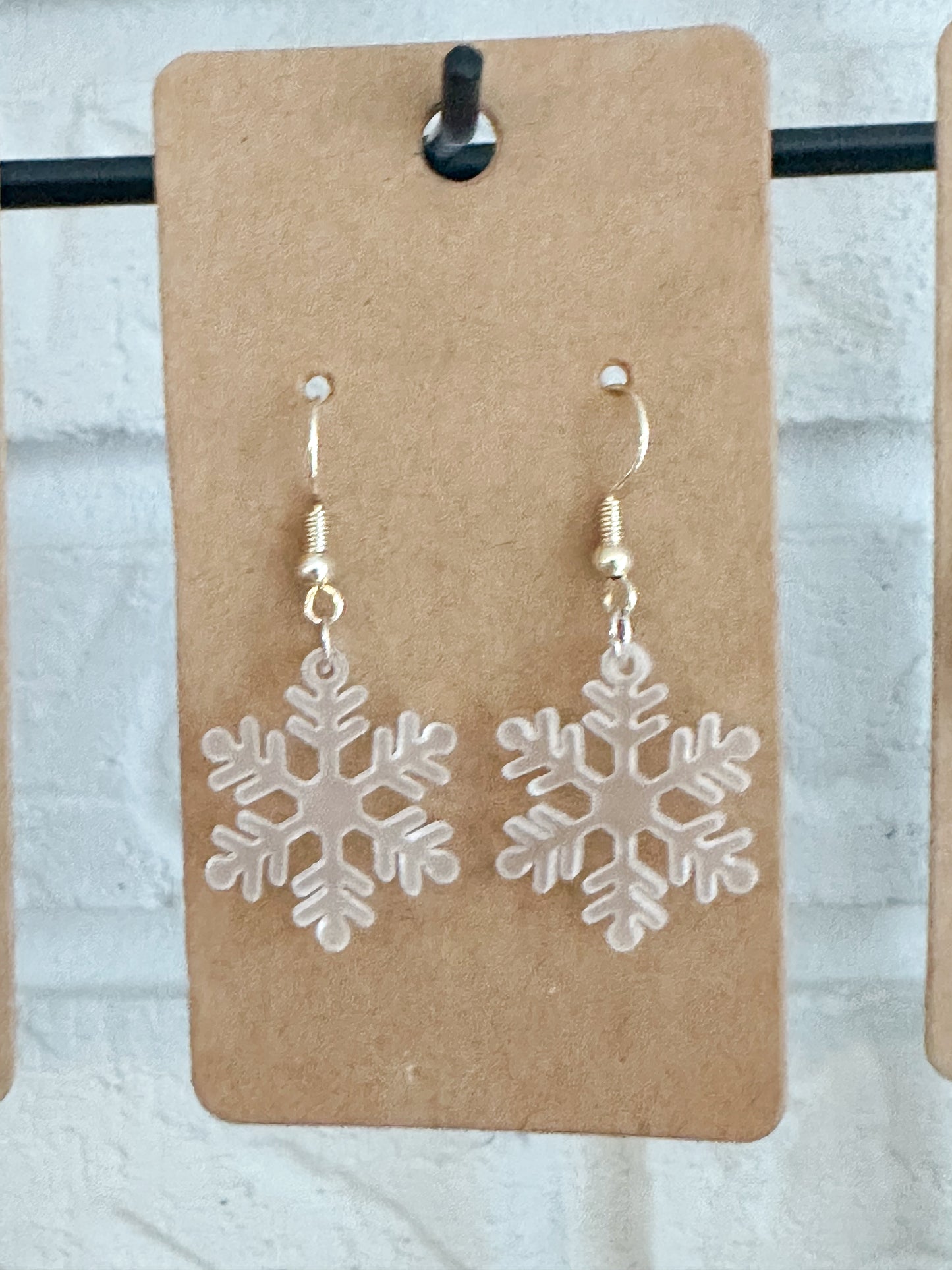 Snowflake dangle earrings